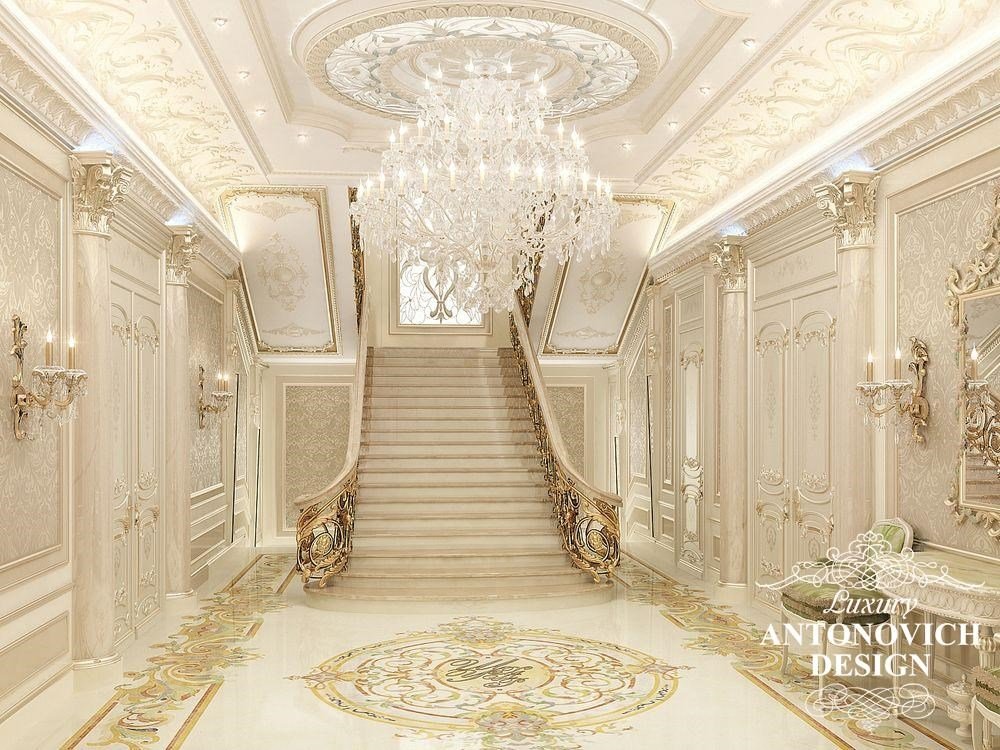 Элитный дизайн интерьера дома с роскошной лестницей в классическом стиле от студии дизайна интерьеров Антонович Дизайн